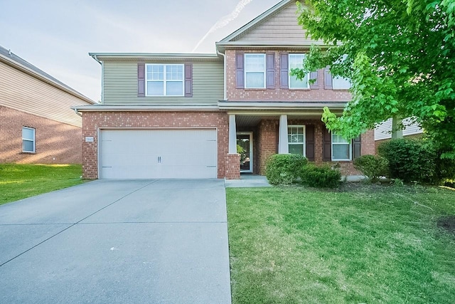 view of front of property with concrete driveway, a garage, a front lawn, and brick siding