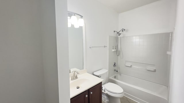 bathroom with toilet, tub / shower combination, and vanity