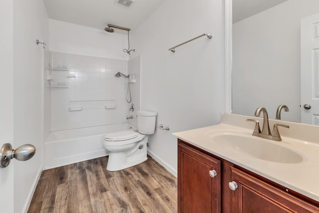 7347 Autumn Crossing Way, Brentwood, TN 37027 - bathroom with vanity, toilet, wood finished floors, baseboards, and bathing tub / shower combination