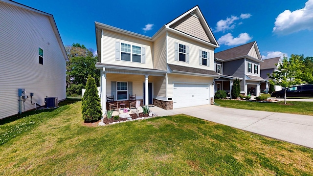 524 Burchell Ln, Columbia, TN 38401 - view of front of home with covered porch, a front yard, an attached garage, central air condition unit, and driveway