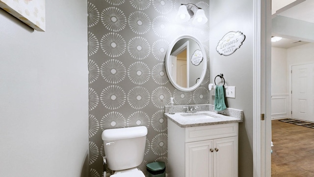 524 Burchell Ln, Columbia, TN 38401 - bathroom featuring vanity, toilet, and wood finished floors