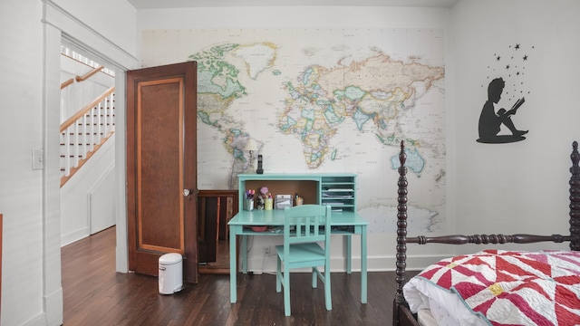 bedroom with wood finished floors