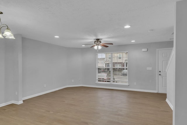 3031 Rg Buchanan Dr, La Vergne, TN 37086 - empty room featuring recessed lighting, ceiling fan, baseboards, a textured ceiling, and wood finished floors