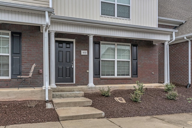 3031 Rg Buchanan Dr, La Vergne, TN 37086 - view of exterior entry with a porch and brick siding
