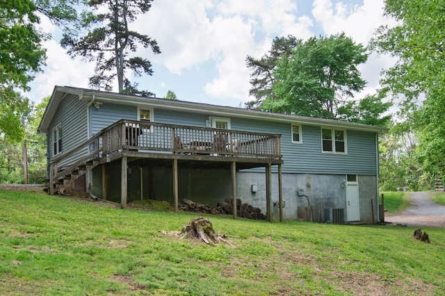 5070 Ridge Rd, Joelton, TN 37080 - back of property with central AC, a wooden deck, and a lawn