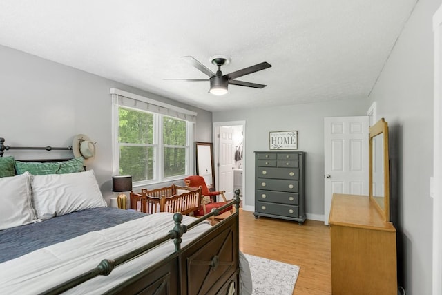 5070 Ridge Rd, Joelton, TN 37080 - bedroom featuring a ceiling fan, ensuite bath, baseboards, and light wood-type flooring