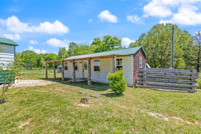 10931 Beechcraft Rd, Bon Aqua, TN 37025 - view of outbuilding featuring fence