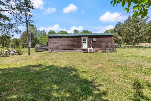 10931 Beechcraft Rd, Bon Aqua, TN 37025 - exterior space featuring a lawn and cooling unit