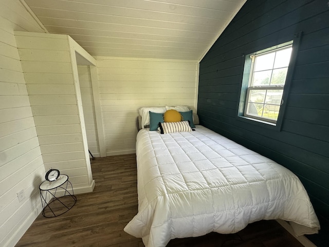10931 Beechcraft Rd, Bon Aqua, TN 37025 - bedroom featuring wood finished floors, lofted ceiling, and wooden walls