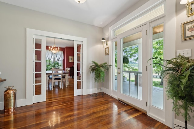 1494 Grant Rd, Watertown, TN 37184 - doorway featuring an inviting chandelier, french doors, and dark wood-type flooring