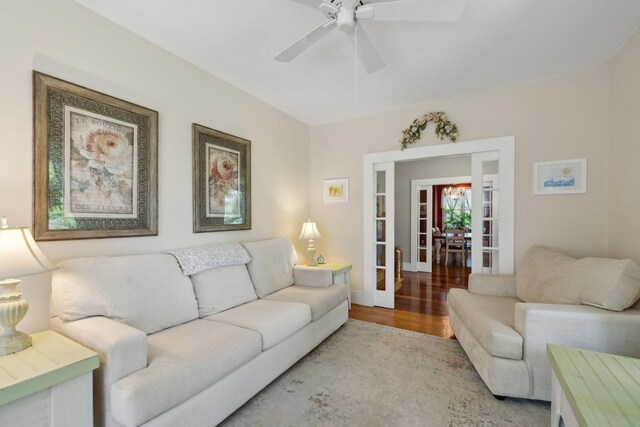 1494 Grant Rd, Watertown, TN 37184 - living area featuring french doors, baseboards, ceiling fan, and wood finished floors