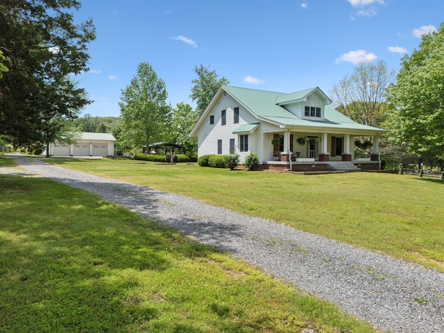 1494 Grant Rd, Watertown, TN 37184 - view of front facade featuring a porch, a garage, and a front yard