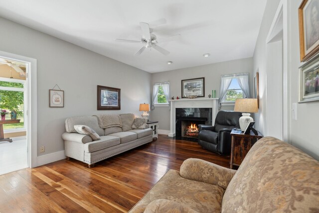 1494 Grant Rd, Watertown, TN 37184 - living area with a high end fireplace, a ceiling fan, baseboards, and hardwood / wood-style flooring
