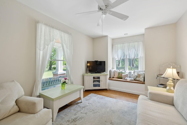 1494 Grant Rd, Watertown, TN 37184 - living room featuring a ceiling fan, wood finished floors, and a wealth of natural light