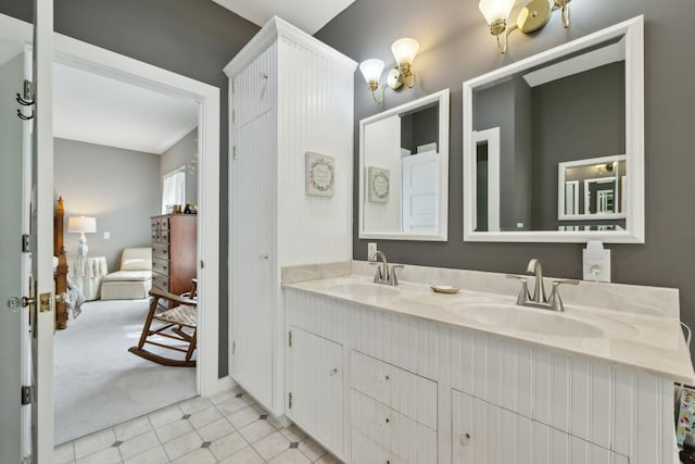 1494 Grant Rd, Watertown, TN 37184 - ensuite bathroom featuring double vanity, a sink, connected bathroom, and tile patterned floors
