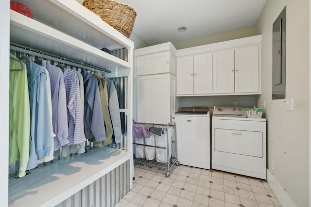 1494 Grant Rd, Watertown, TN 37184 - clothes washing area with washer and dryer, electric panel, and cabinet space