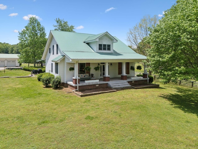 1494 Grant Rd, Watertown, TN 37184 - back of house featuring a porch, a yard, and metal roof