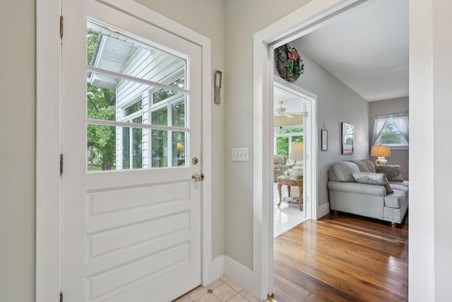 1494 Grant Rd, Watertown, TN 37184 - doorway to outside featuring baseboards and wood finished floors