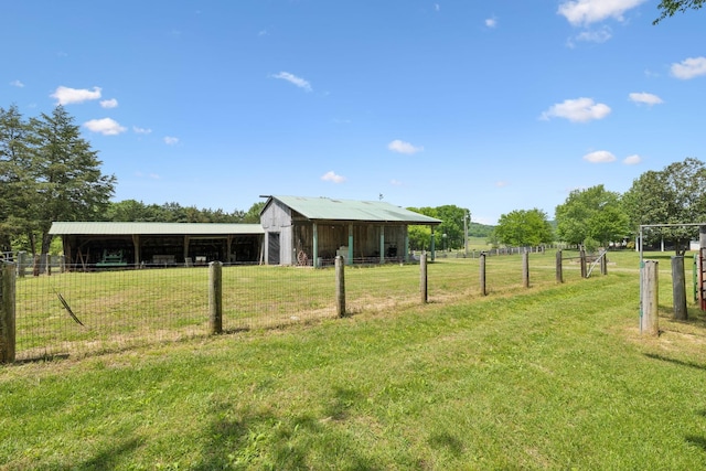 1494 Grant Rd, Watertown, TN 37184 - view of yard with an outdoor structure, a pole building, and fence