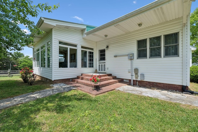 1494 Grant Rd, Watertown, TN 37184 - rear view of house featuring a lawn