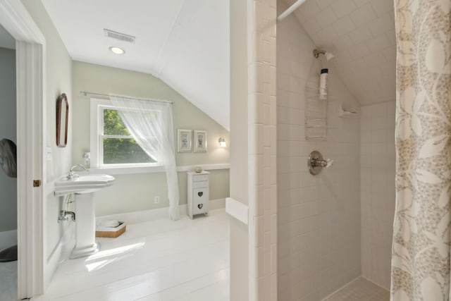 1494 Grant Rd, Watertown, TN 37184 - full bath with a tile shower, vaulted ceiling, and visible vents