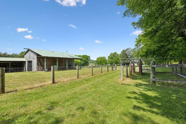 1494 Grant Rd, Watertown, TN 37184 - view of yard featuring an outdoor structure and an exterior structure