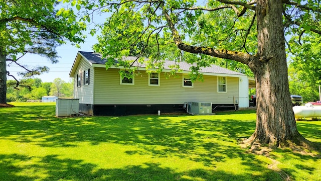 4471 Seminary Rd, Smyrna, TN 37167 - back of property with a lawn and central AC
