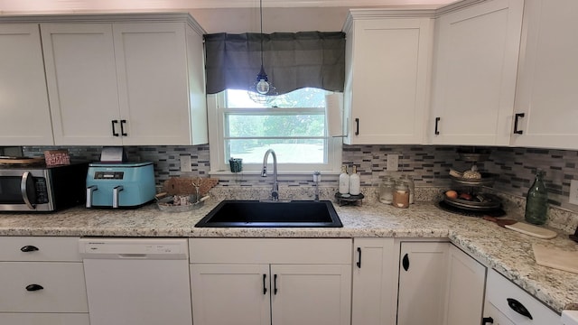 4471 Seminary Rd, Smyrna, TN 37167 - kitchen with stainless steel microwave, tasteful backsplash, dishwasher, and a sink