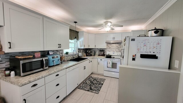 4471 Seminary Rd, Smyrna, TN 37167 - kitchen featuring tasteful backsplash, white appliances, under cabinet range hood, a sink, and a ceiling fan