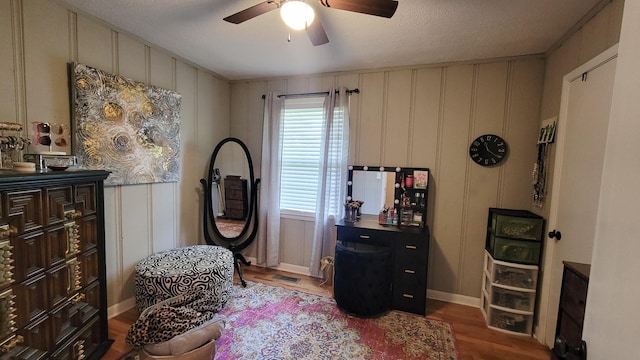 4471 Seminary Rd, Smyrna, TN 37167 - living area featuring baseboards, wood finished floors, ceiling fan, and a decorative wall