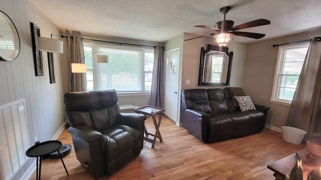 4471 Seminary Rd, Smyrna, TN 37167 - living room with visible vents, a textured ceiling, and light wood finished floors