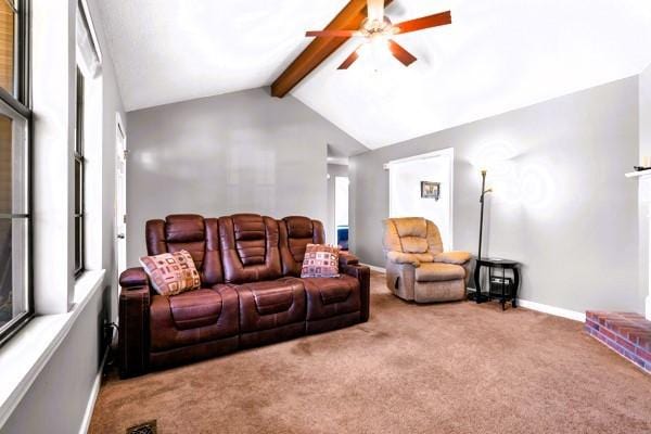 living area with carpet floors, ceiling fan, and baseboards
