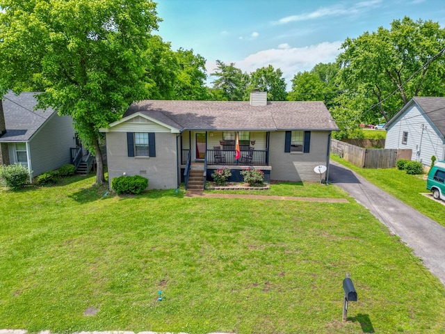 single story home featuring a porch, stairs, a chimney, and brick siding