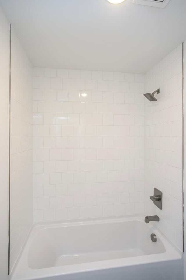 full bathroom with washtub / shower combination