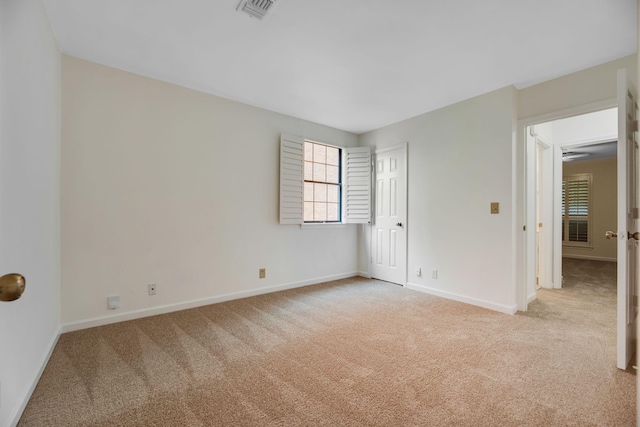 1202 General George Patton Rd, Nashville, TN 37221 - spare room featuring visible vents, baseboards, and light carpet