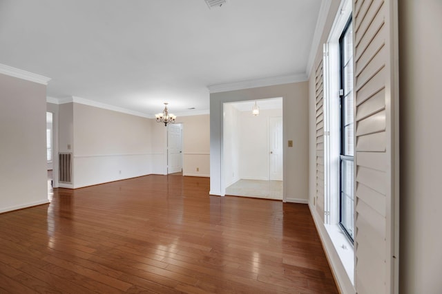 1202 General George Patton Rd, Nashville, TN 37221 - interior space with dark wood finished floors, visible vents, an inviting chandelier, and crown molding