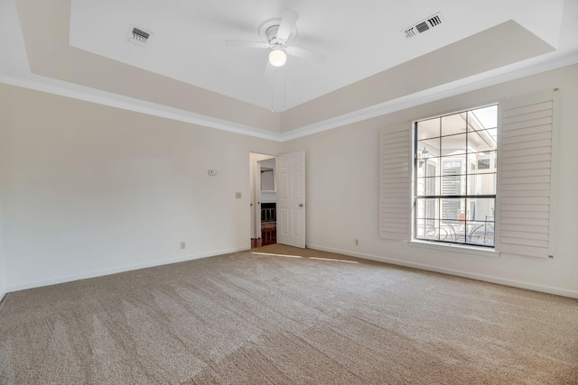1202 General George Patton Rd, Nashville, TN 37221 - carpeted spare room with visible vents, a ceiling fan, a tray ceiling, and baseboards