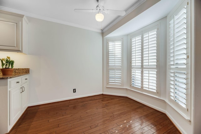 1202 General George Patton Rd, Nashville, TN 37221 - unfurnished dining area featuring a healthy amount of sunlight, ornamental molding, ceiling fan, and wood-type flooring