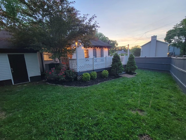 yard at dusk with fence