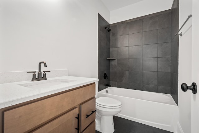 full bath with toilet, vanity, tile patterned flooring, and shower / bath combination