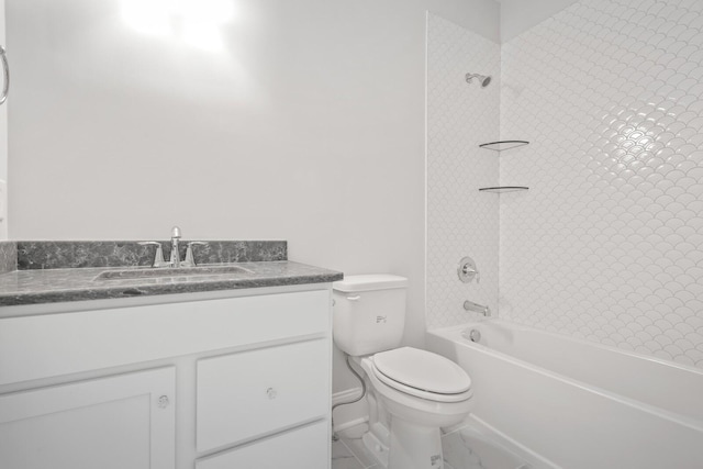 bathroom featuring vanity, toilet, marble finish floor, baseboards, and tub / shower combination