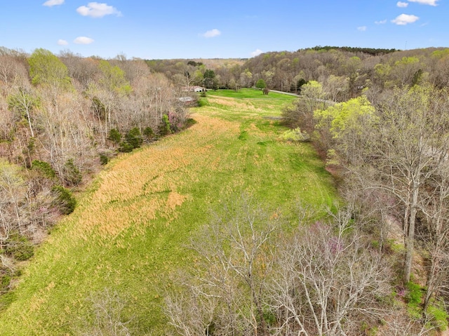 aerial view with a wooded view