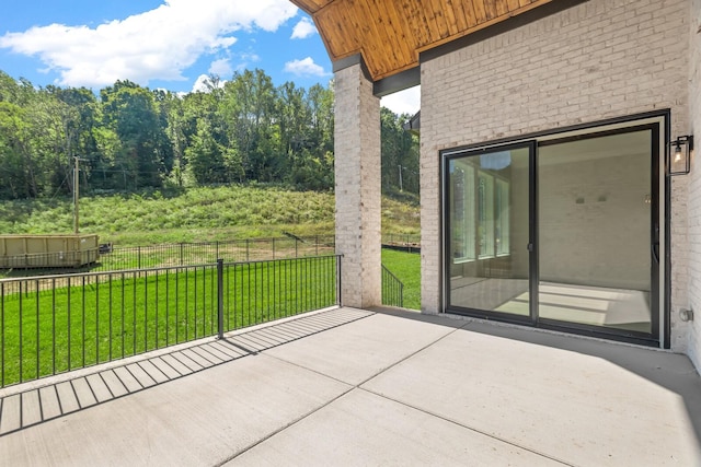 view of patio featuring fence