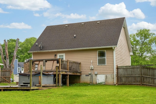 106 Windellwood Cir, Smyrna, TN 37167 - back of property featuring a hot tub, a wooden deck, and a shingled roof
