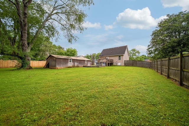 106 Windellwood Cir, Smyrna, TN 37167 - view of yard with an outbuilding, a shed, and a wooden deck
