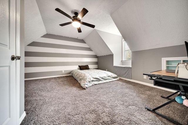 106 Windellwood Cir, Smyrna, TN 37167 - carpeted bedroom featuring a textured ceiling, ceiling fan, vaulted ceiling, and baseboards