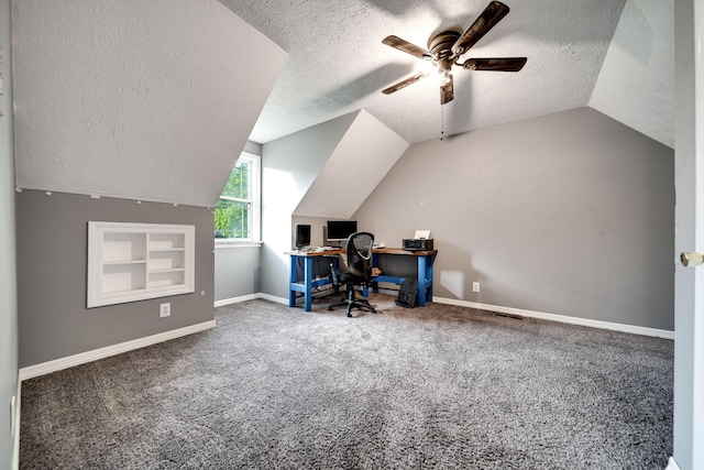 106 Windellwood Cir, Smyrna, TN 37167 - carpeted office with a textured ceiling, vaulted ceiling, ceiling fan, baseboards, and built in features