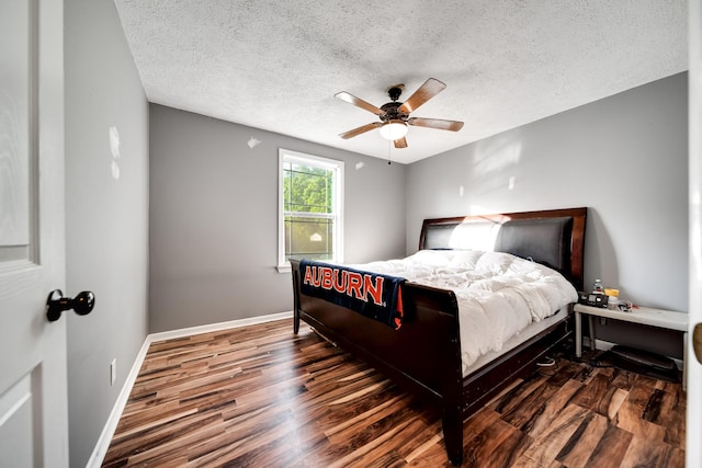 106 Windellwood Cir, Smyrna, TN 37167 - bedroom featuring wood finished floors, baseboards, a textured ceiling, and ceiling fan