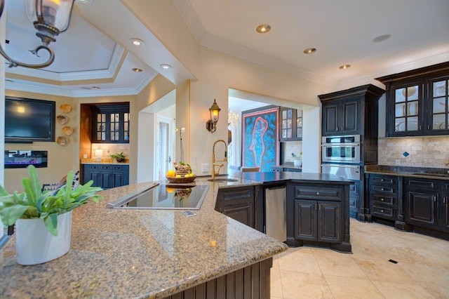 140 Lake Shore Ln, Henderson, TN 38340 - kitchen featuring glass insert cabinets, black electric cooktop, a sink, and backsplash
