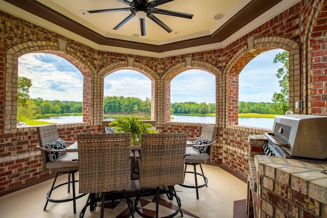 140 Lake Shore Ln, Henderson, TN 38340 - view of patio featuring outdoor dining space, a ceiling fan, and a water view